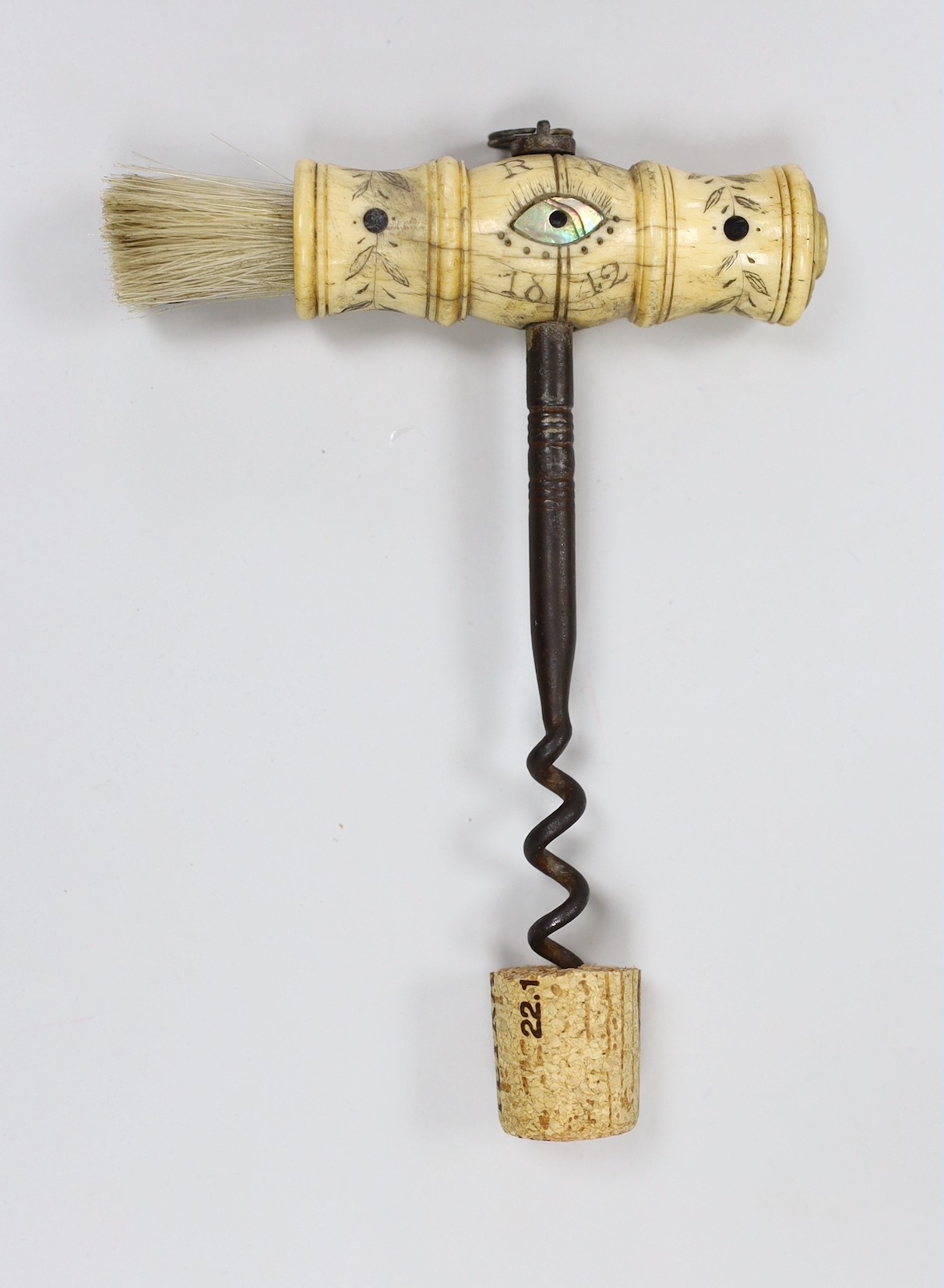 A 19th century carved bone handled cork screw, dated 1842